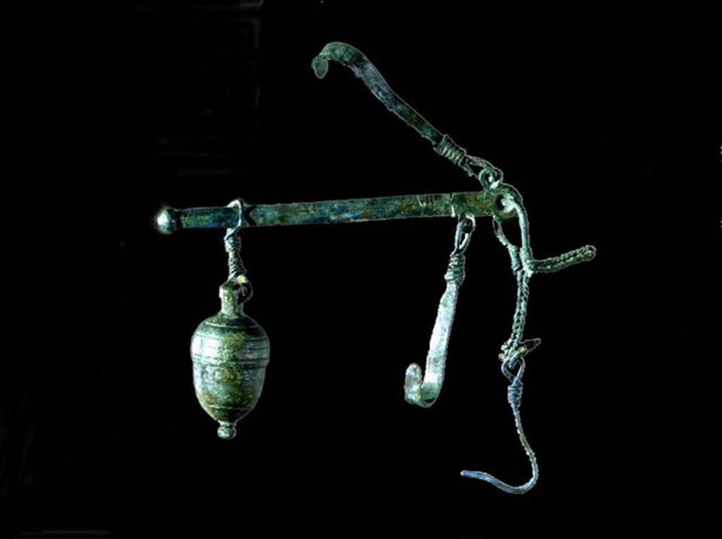 I.14.12 Pompeii. Bronze balance. SAP 43368. Photographed at �A Day in Pompeii� exhibition at Melbourne Museum.  September 2009.