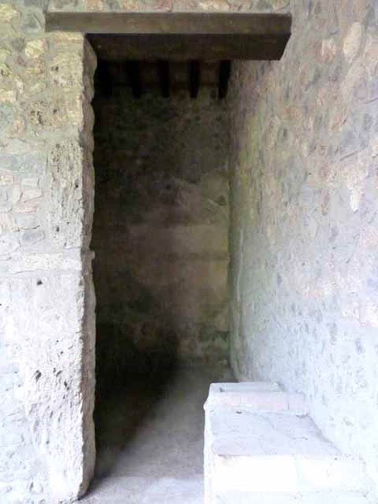 I.15.3 Pompeii. May 2010.
Looking north into room 2 in north-east corner, next to triclinium 1.