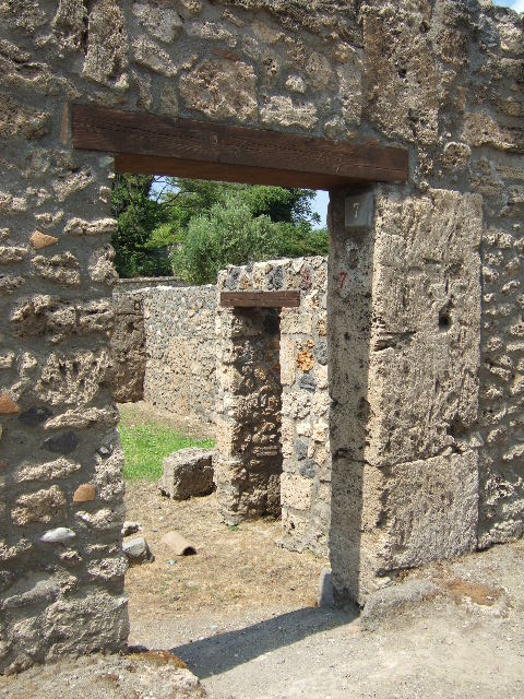 I.16.7 Pompeii. December 2006. North-east corner of room at south end of corridor.