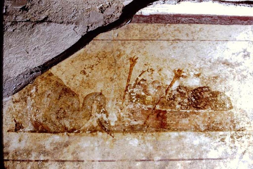 II.1.12 Pompeii. 1971. Upper part of west wall of triclinium with wall painting of a swan, a basket and two torches. Photo by Stanley A. Jashemski.
Source: The Wilhelmina and Stanley A. Jashemski archive in the University of Maryland Library, Special Collections (See collection page) and made available under the Creative Commons Attribution-Non Commercial License v.4. See Licence and use details.
J71f0166