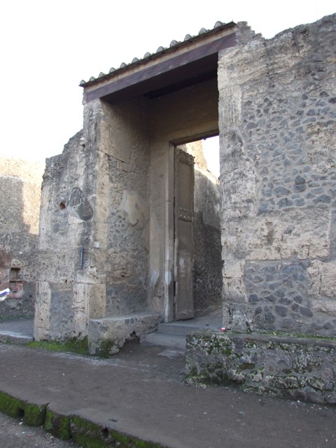 II.2.2 Pompeii.  December 2005. Cast of door on east side.   