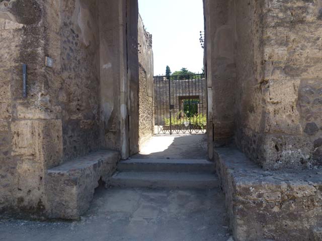 II.2.2 Pompeii.  March 2009.  North west corner of atrium, with door to II.2.1
