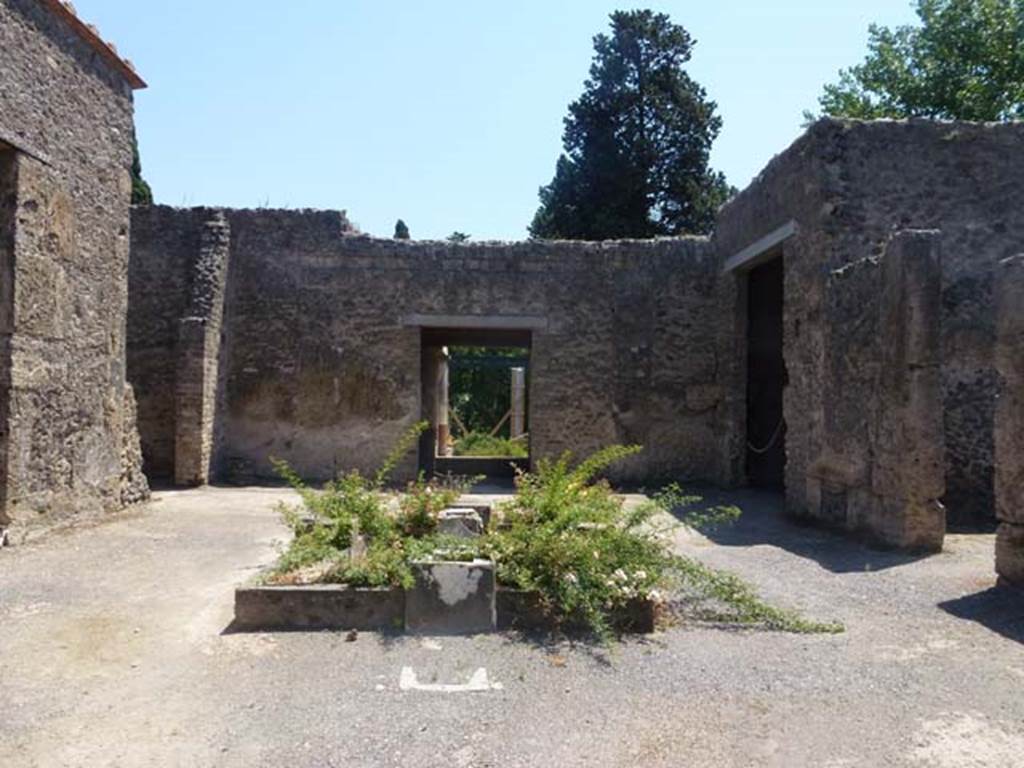 II.2.2 Pompeii. June 2012. Looking south across atrium 2, from entrance corridor 1.
Photo courtesy of Michael Binns.
