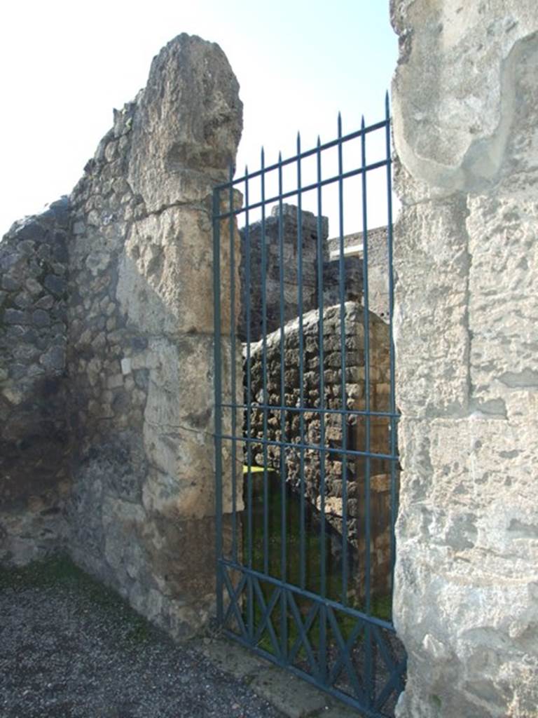 II.2.2 Pompeii. March 2009. North west corner of atrium, with door to II.2.1