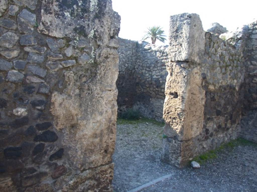 II.2.2 Pompeii. March 2009. Door to room 4, Triclinium, on west side of atrium.