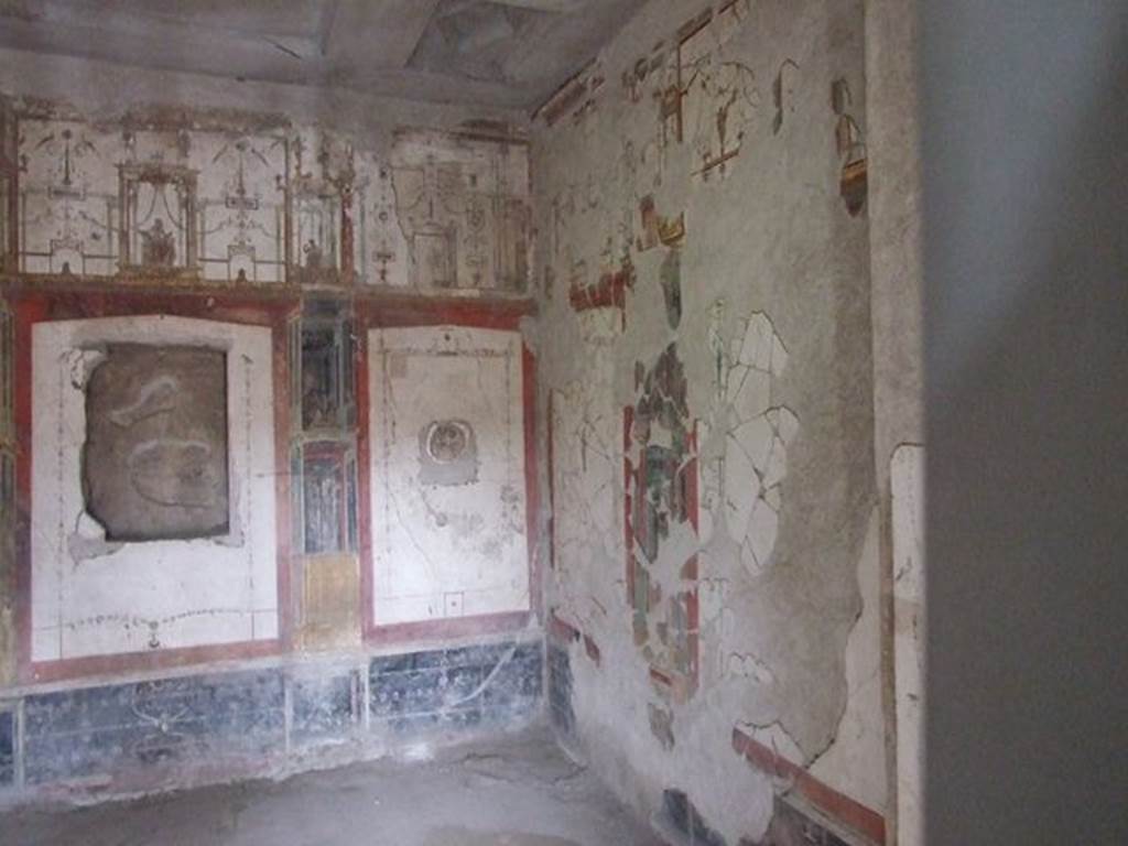 II.2.2 Pompeii. December 2006.
Room “f”, west and north walls showing the restored walls from the saved minute fragments.