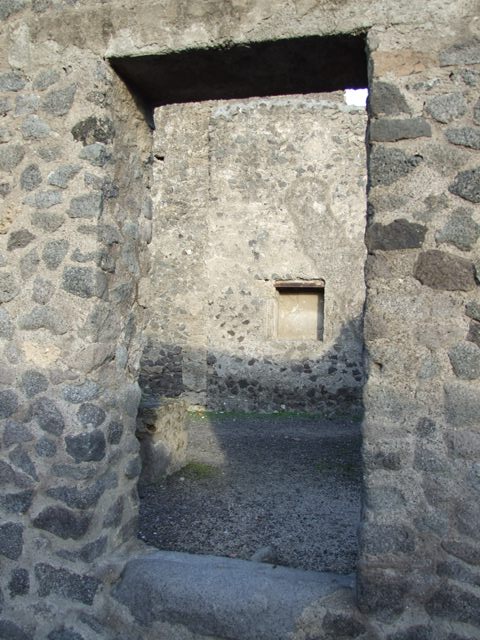II.2.6 Side entrance of bar at II.2.1 and water tower