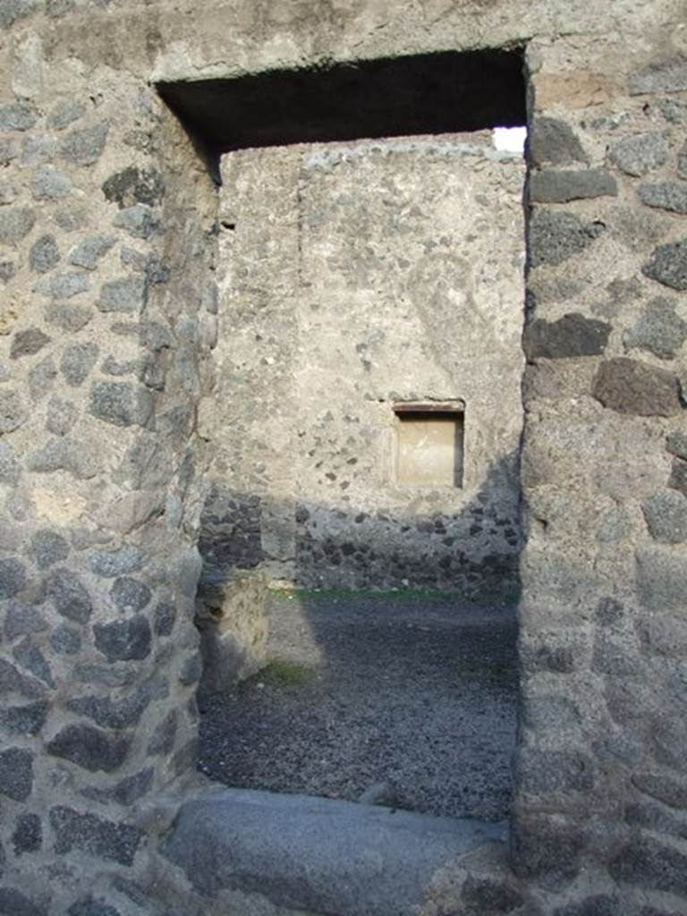 II.2.6 Side entrance of bar at II.2.1 and water tower