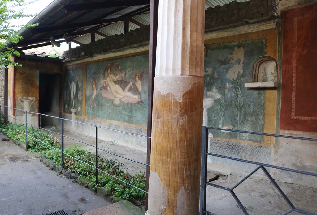 II.3.3 Pompeii. December 2006. Room 11, west panel of south wall of peristyle. Detail of wall painting of fountain with garden and birds.

