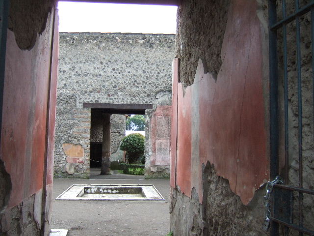II.3.3 Pompeii. December 2005. Room 2, east wall of atrium.