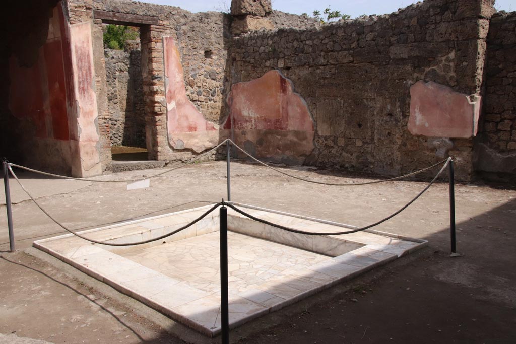 II.3.3 Pompeii. May 2024. Room 2, looking north-east across impluvium in atrium. Photo courtesy of Klaus Heese.