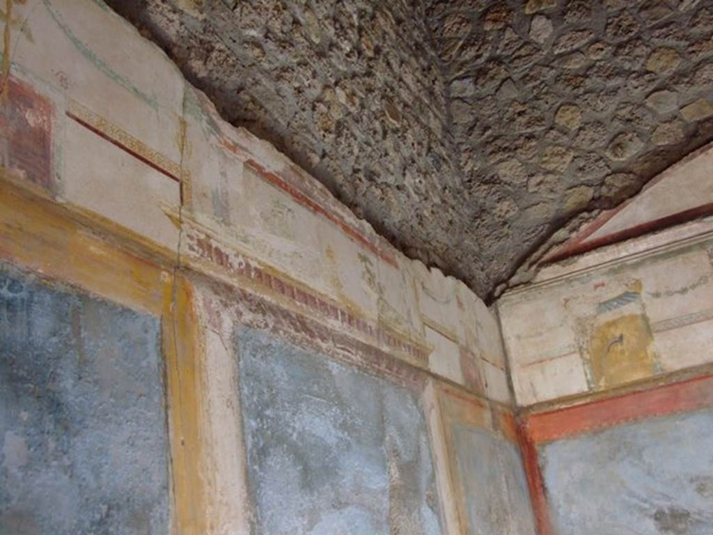 II.3.3 Pompeii. March 2009. Room 10, West wall. Painting of flying cherub.