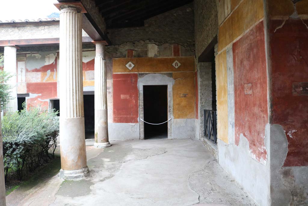 II.3.3 Pompeii. December 2018.
Room 11, looking towards west portico across north portico, with doorway to room 12, in centre, and doorway to room 5, centre right.
Photo courtesy of Aude Durand.