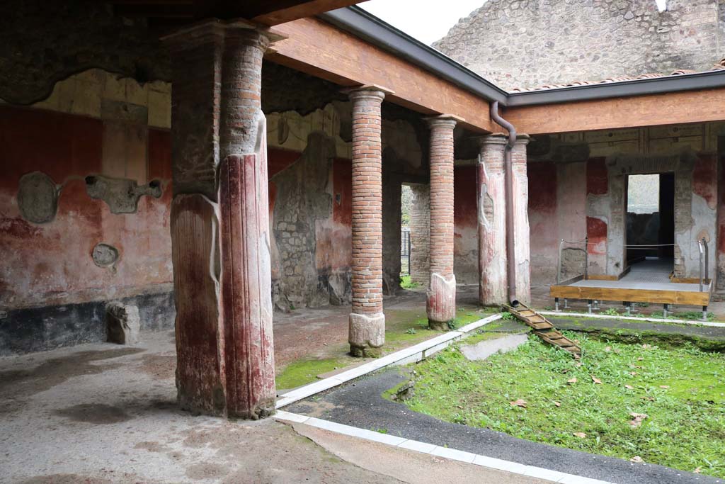 II.4.6 Pompeii. December 2018.
Looking towards the east side and south-east corner of the portico of the baths, from entrance doorway. Photo courtesy of Aude Durand.