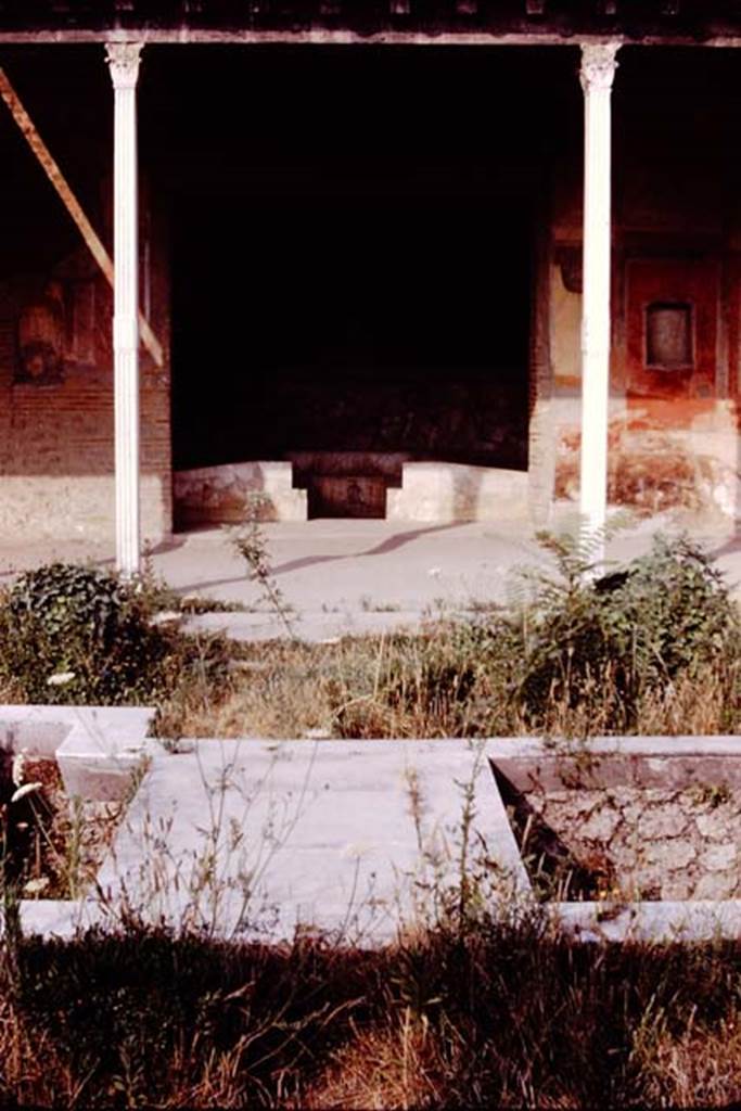 II.4.6 Pompeii. 1977. Looking west from garden water feature towards the entrance to the summer triclinium. Photo by Stanley A. Jashemski.
Source: The Wilhelmina and Stanley A. Jashemski archive in the University of Maryland Library, Special Collections (See collection page) and made available under the Creative Commons Attribution-Non Commercial License v.4. See Licence and use details. J77f0442