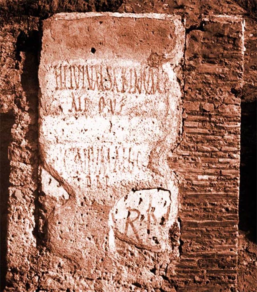 III.1.1 Pompeii. Pilaster between III.1.1 and III.1.2, with the remains of graffiti painted in red.
According to Della Corte in NdS, discovered on the simply plastered external wall, between entrances 1 and 2, was the electoral programma:
HELVIVM SABINVM AED O V F
And slightly below this also in red
LICINIVM AED O V F D R P
See Notizie degli Scavi di Antichità, 1913, p. 223.