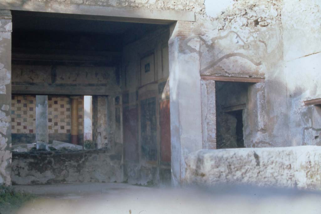 III.2.1 Pompeii. 4th December 1971. Looking across atrium towards north-east corner of tablinum and east wall. 
Photo courtesy of Rick Bauer, from Dr.George Fay�s slides collection.
