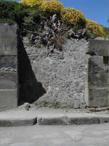 III.3.2 Pompeii. May 2005. Entrance doorway, partly excavated.
For the graffiti originally found on the left pilaster, between III.3.1 and III.3.2, see III.3.1.
