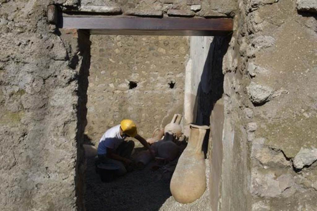 III.3.6 Pompeii. December 2017. Room in north-east corner at rear with amphorae during excavation. Photo � Parco Archeologico di Pompei.
