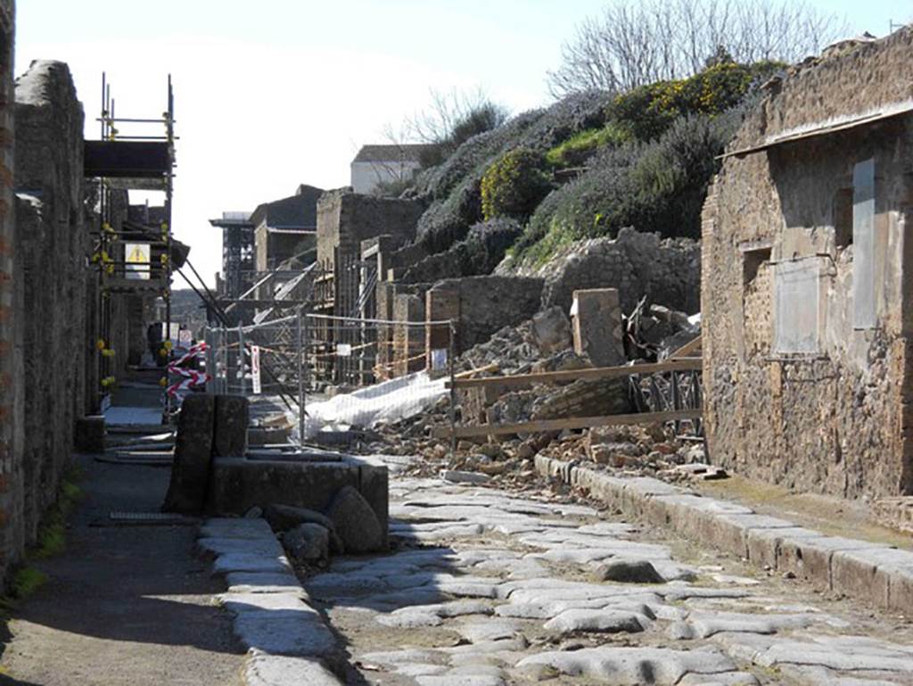 III.4.1 Pompeii. February 2011.
Looking west along Via dell�Abbondanza to III.4.1 and III.3.6. Photo courtesy of Guy de la Bedoyere.

