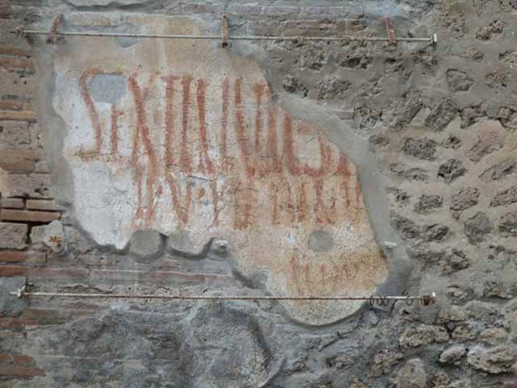 III.4.3 Pompeii. May 2010. CIL IV 7711 at east end of front wall.
According to Epigraphik-Datenbank Clauss/Slaby (See www.manfredclauss.de), this read as �
L(ucium)  Sextilium 
[                                    [CIL IV 7711]
According to a note of Varone and Stefani, this has now become more readable �
L. Sextilium Sy[rticum] 
II V.I.D. [P]inariu[s�]
[�]                               [CIL IV 7711]
See Varone, A. and Stefani, G., 2009. Titulorum Pictorum Pompeianorum, Rome: L�erma di Bretschneider, (p.272)


