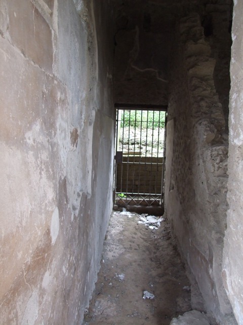 III.4.b Pompeii. March 2009. Room 3, oecus. East side of window on south wall with remains of a wall painting of a Hermaphrodite grooming before a mirror.