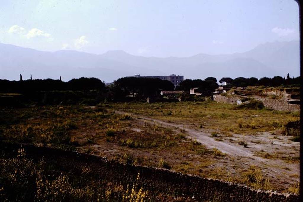 III.7 Pompeii. 1964. Looking south-west across site towards II.4 from outside walls, near T7. Photo by Stanley A. Jashemski.
Source: The Wilhelmina and Stanley A. Jashemski archive in the University of Maryland Library, Special Collections (See collection page) and made available under the Creative Commons Attribution-Non Commercial License v.4. See Licence and use details.
J64f2006