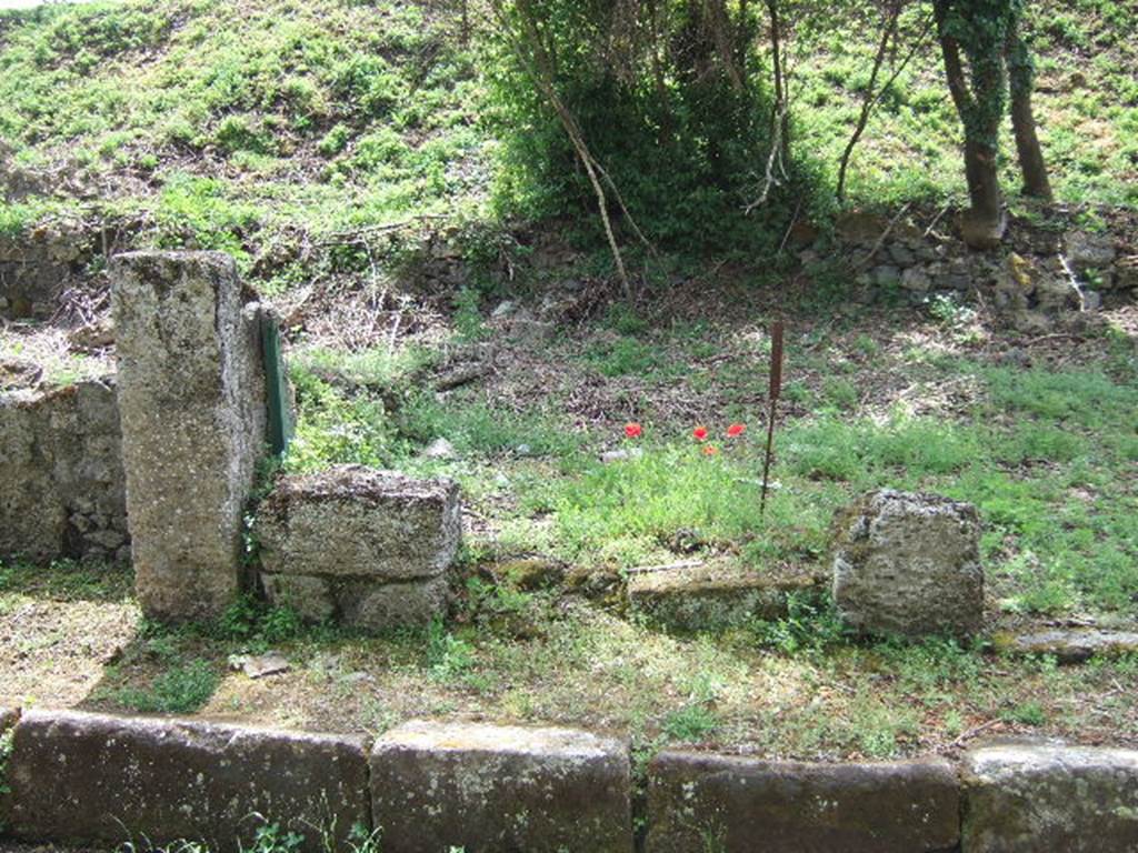 III.10.5 Pompeii. May 2006. Remains of front wall on east side of entrance.