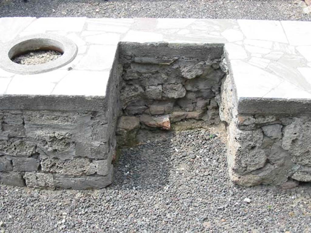 V.1.1 Pompeii. May 2003. Looking towards area of hearth on west side of counter.
Photo courtesy of Nicolas Monteix.