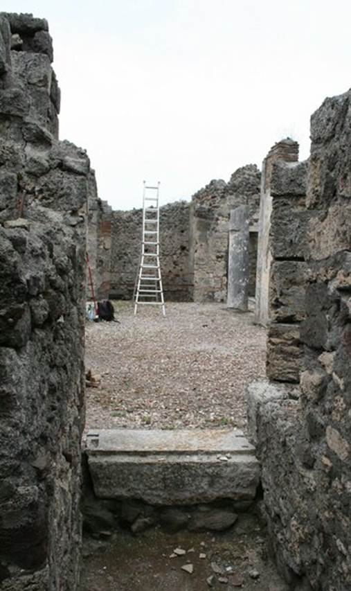 V.1.7 Pompeii. c.2005-7.
Room 12, west wall with doorway to peristyle “b”. Photo by Thomas Staub.
Photo courtesy of Swedish Pompeii Project.