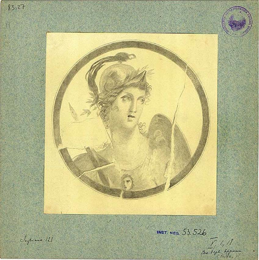 V.1.18 Pompeii. Atrium “b”. Drawing of medallion painting with bust of Athena/Minerva with helmet, shield and lance.
DAIR 83.27. Photo © Deutsches Archäologisches Institut, Abteilung Rom, Arkiv.
See http://arachne.uni-koeln.de/item/marbilder/5022203
Found on the entrance wall, left of the fauces (from in the atrium).
See Bullettino dell’Instituto di Corrispondenza Archeologica (DAIR), 1877, p. 20.