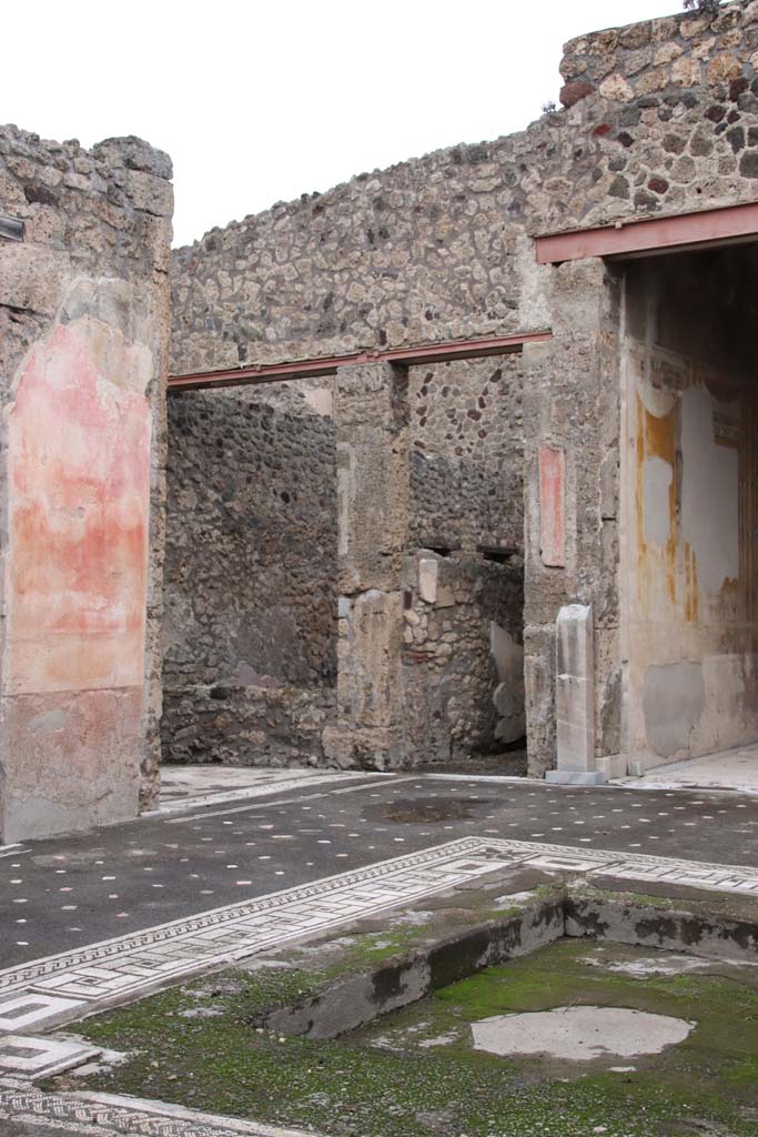 V.1.26 Pompeii. October 2020.
Looking north-east towards Room “e”, corridor to rear and north side of tablinum.
Photo courtesy of Klaus Heese.