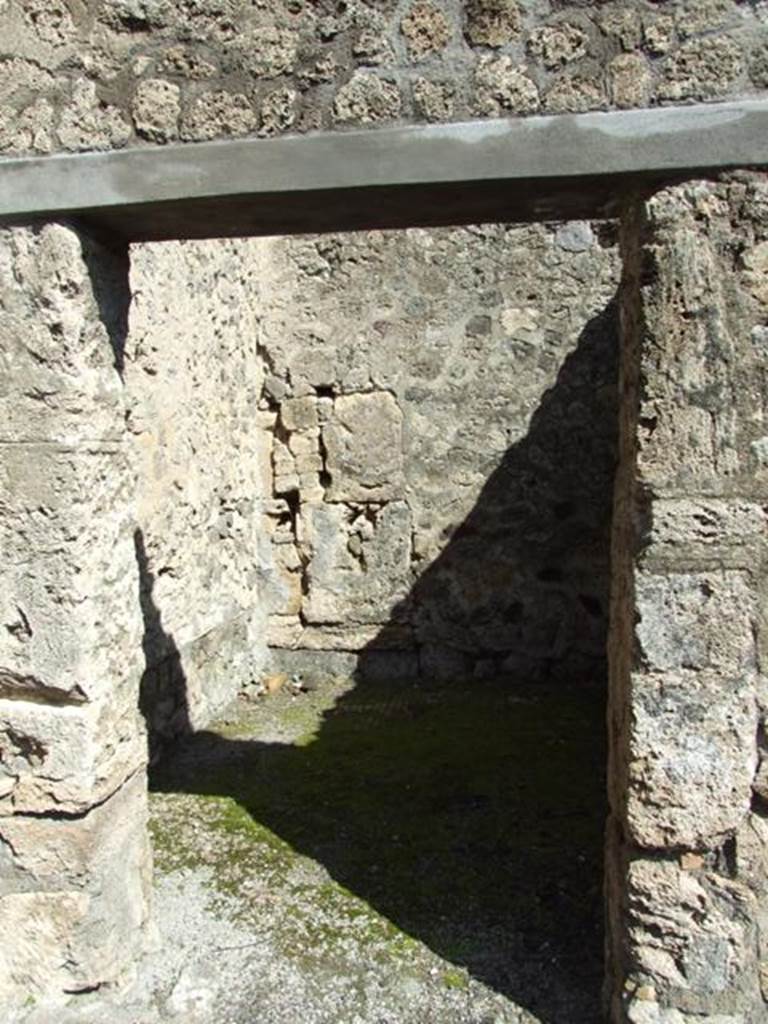 V.2.1 Pompeii. March 2009. Doorway to room 3, cubiculum.
According to BdI, this was room �s� and did not have anything other than rough plaster.
