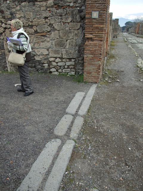 V.2.1 Pompeii. March 2009. Room 1, looking west towards doorways to rooms 5, 6 and 7 in atrium.