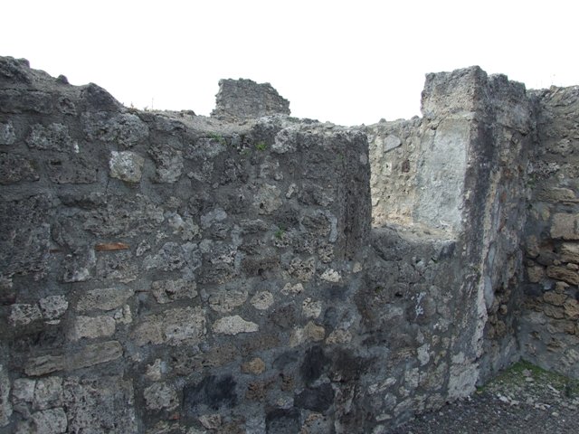 V.2.6 Pompeii.  March 2009.  South west corner of rear room.