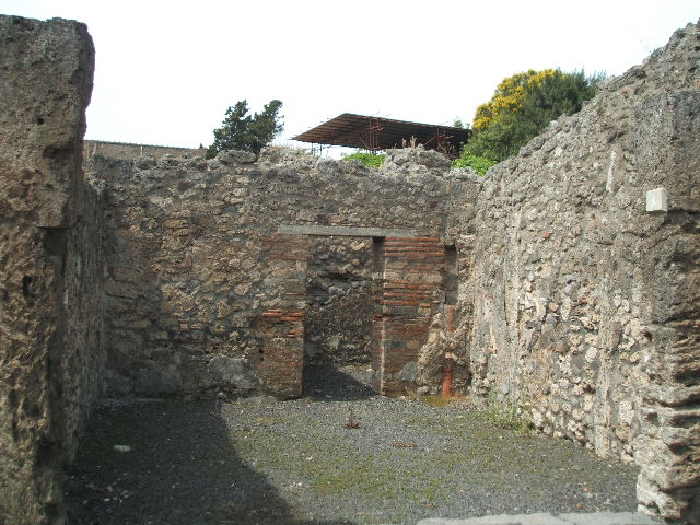 V.2.8 Pompeii. March 2009.  North wall of rear room.