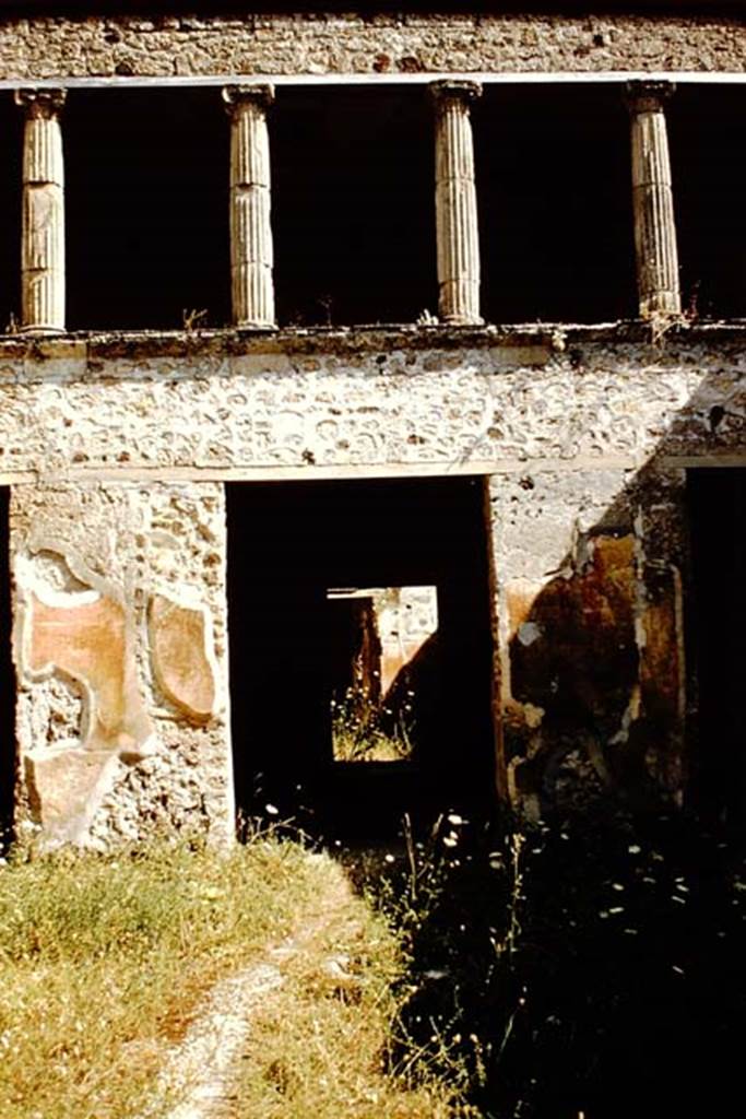 V.2.h Pompeii. 1959. South side of atrium, with doorway to tablinum ‘f’.
At the rear of the tablinum (f), a decorated wall in room (h) can be seen. Photo by Stanley A. Jashemski.
Source: The Wilhelmina and Stanley A. Jashemski archive in the University of Maryland Library, Special Collections (See collection page) and made available under the Creative Commons Attribution-Non Commercial License v.4. See Licence and use details.
J59f0445