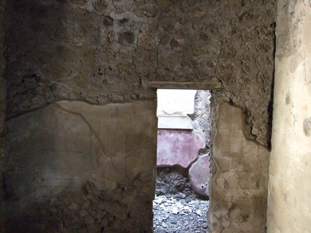 V.2.i Pompeii. March 2009. Room 2b, South wall, with entrance to small recess or cupboard area under stairs in Room 2c.