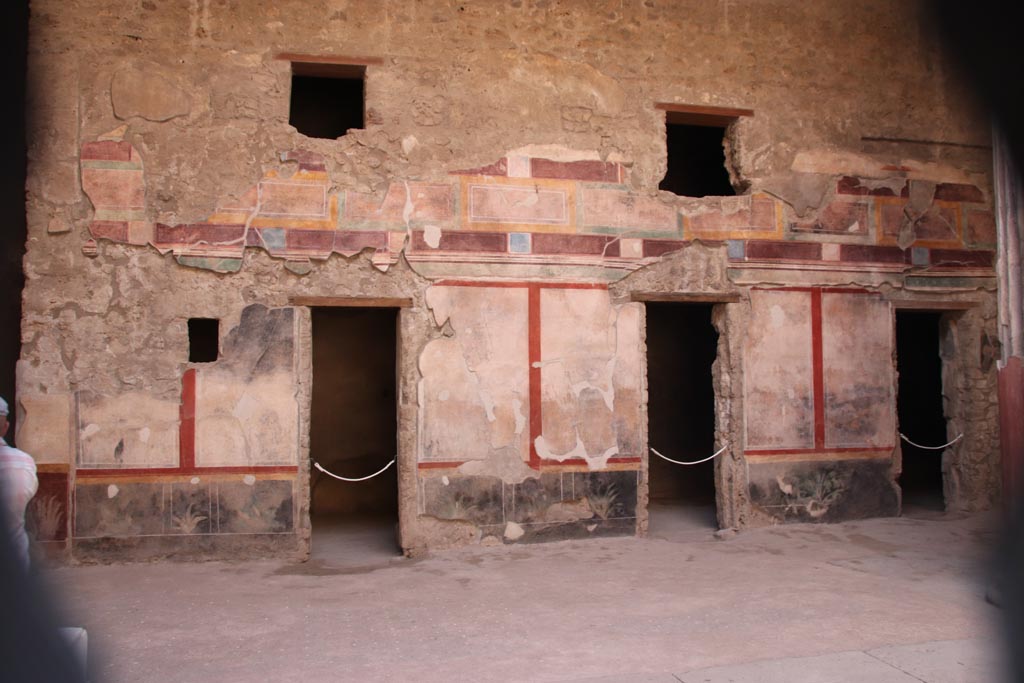 V.2.i Pompeii. October 2023. Room 1, west side of atrium, with doorways 2c, 2b, and 2a.Photo courtesy of Klaus Heese.