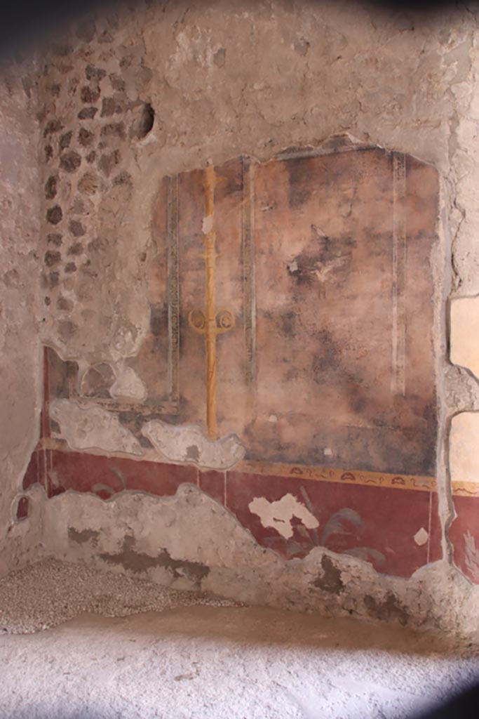 V.2.i Pompeii. October 2023.
Room 8, north wall with painted candelabra. Photo courtesy of Klaus Heese.