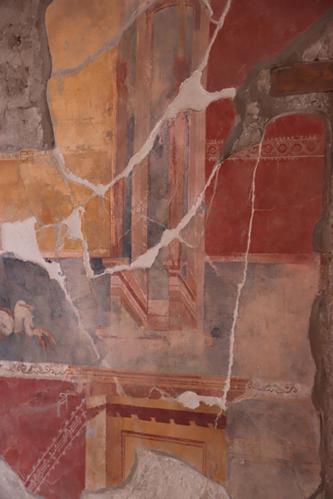 V.2.i Pompeii. October 2023.
Tablinum 7, detail from east wall on south side of central yellow panel. Photo courtesy of Klaus Heese.