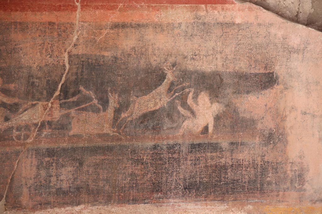 V.2.i Pompeii. October 2023. Tablinum 7, detail from predella at south end of west wall below red side panel. Photo courtesy of Klaus Heese.
