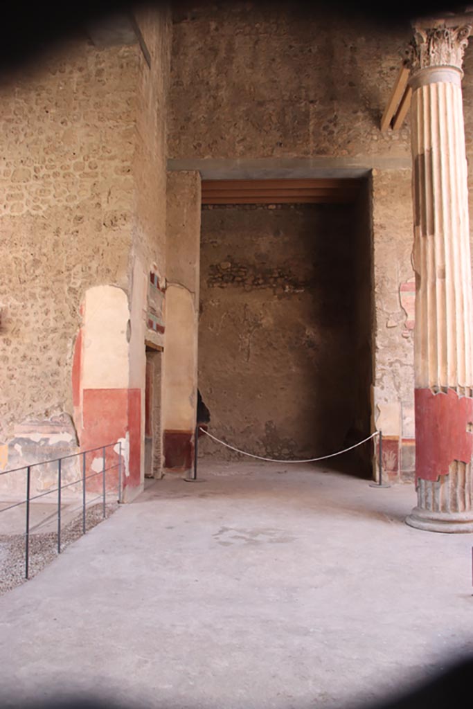 V.2.i Pompeii. October 2023.
Room 1, south side of atrium, looking towards west ala 8.
The tablinum is on left, followed by doorway to corridor 10. Photo courtesy of Klaus Heese.