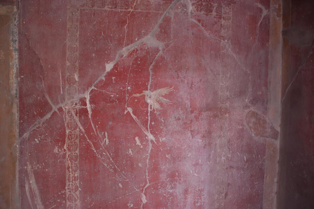V.2.i Pompeii. October 2023. Corridor 10, detail of painted panel on south end of east wall. Photo courtesy of Klaus Heese.