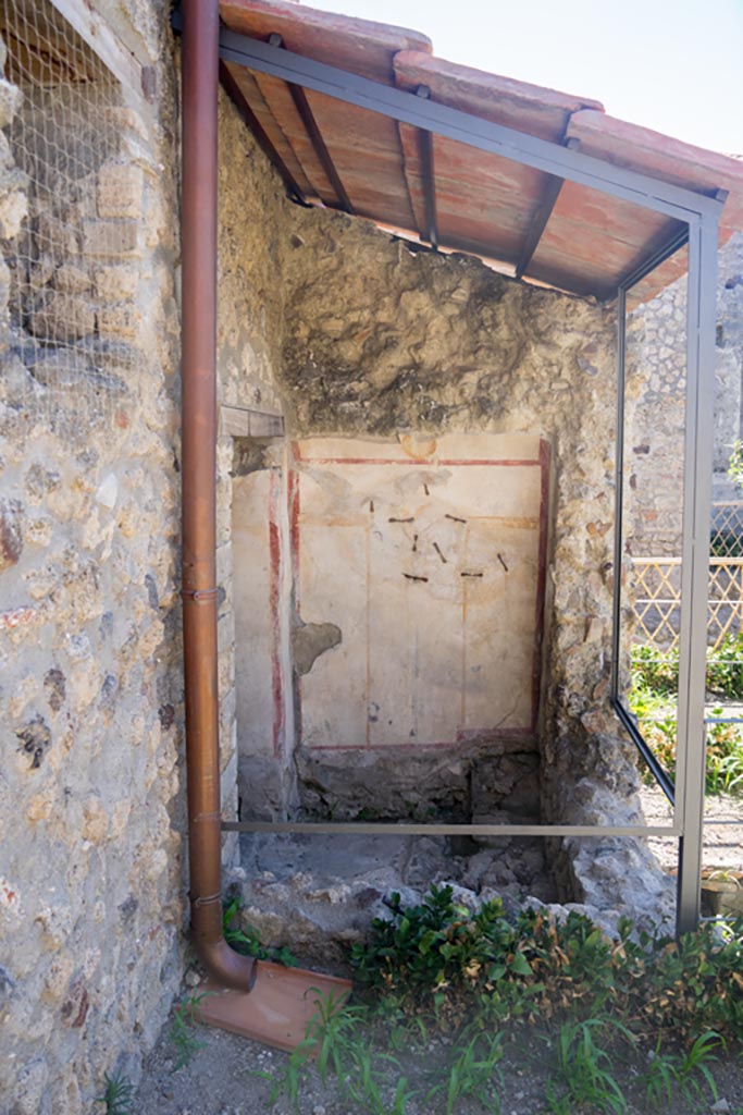 V.2.i Pompeii. August 2023.
Room 13, looking towards south wall of latrine from garden area. Photo courtesy of Johannes Eber.