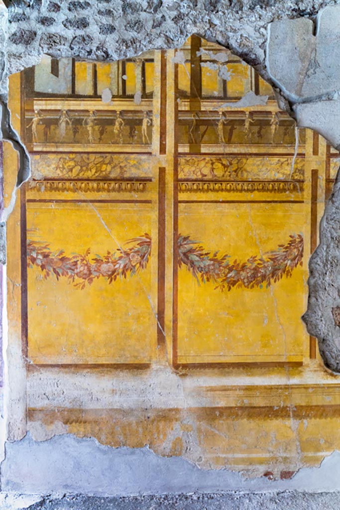 V.2.i Pompeii. March 2023.
Room 19, east wall of exedra at north end. Photo courtesy of Johannes Eber.