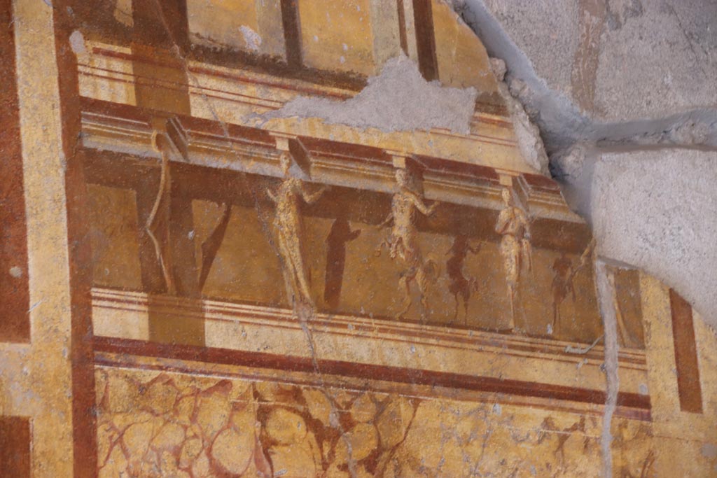 V.2.i Pompeii. October 2023. Room 19, detail from upper east wall in centre. Photo courtesy of Klaus Heese.