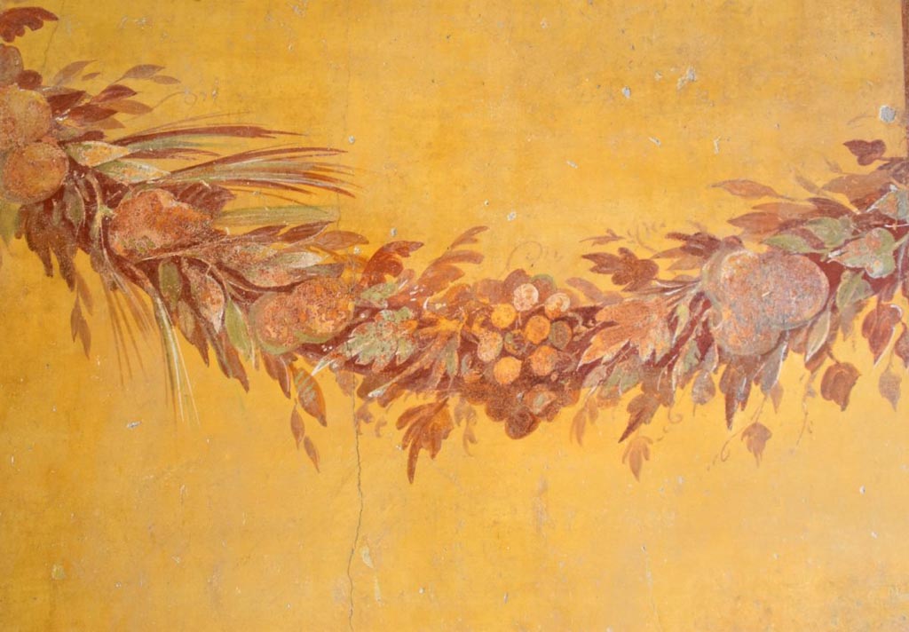 V.2.i Pompeii. July 2023. Room 19. Detail from west wall.
Photograph © Parco Archeologico di Pompei.