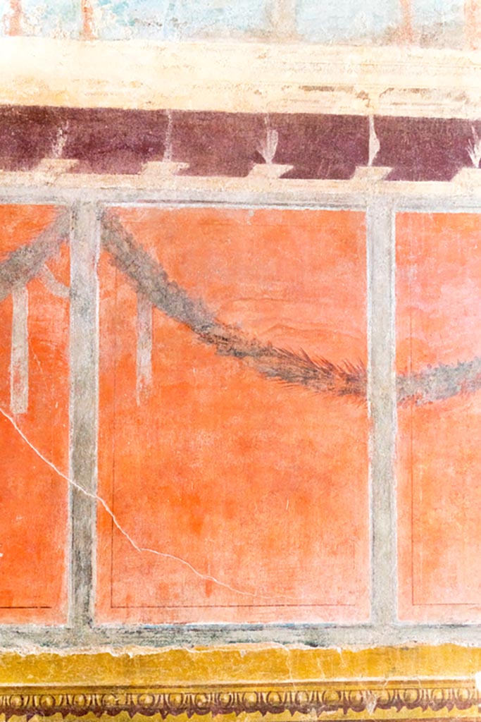 V.2.i Pompeii. March 2023.
Room 21, Corinthian oecus, detail of painted panel on south wall. Photo courtesy of Johannes Eber.
