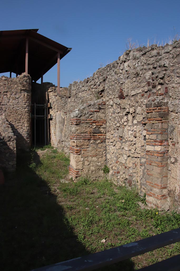 V.3.6 Pompeii. October 2023.
Looking north along east wall of shop-room, towards rear. Photo courtesy of Klaus Heese.